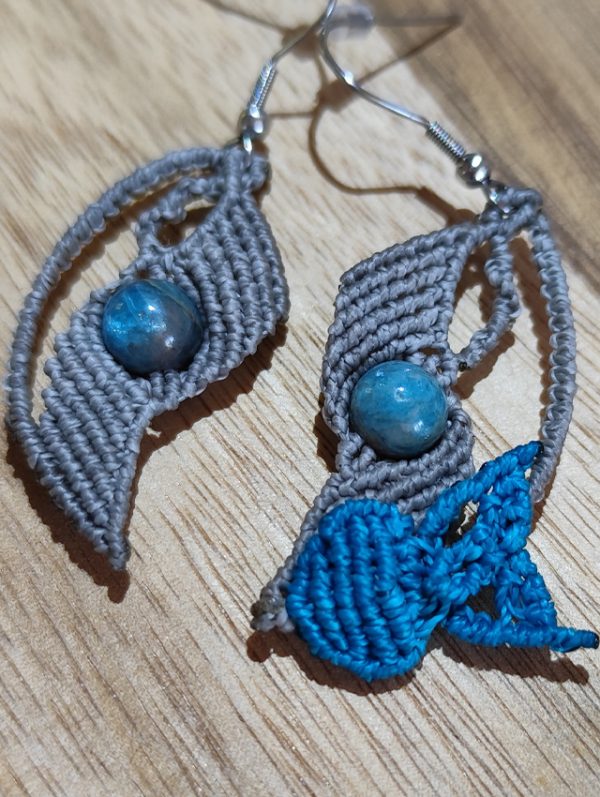 BO03-03 Plumae Noctuae